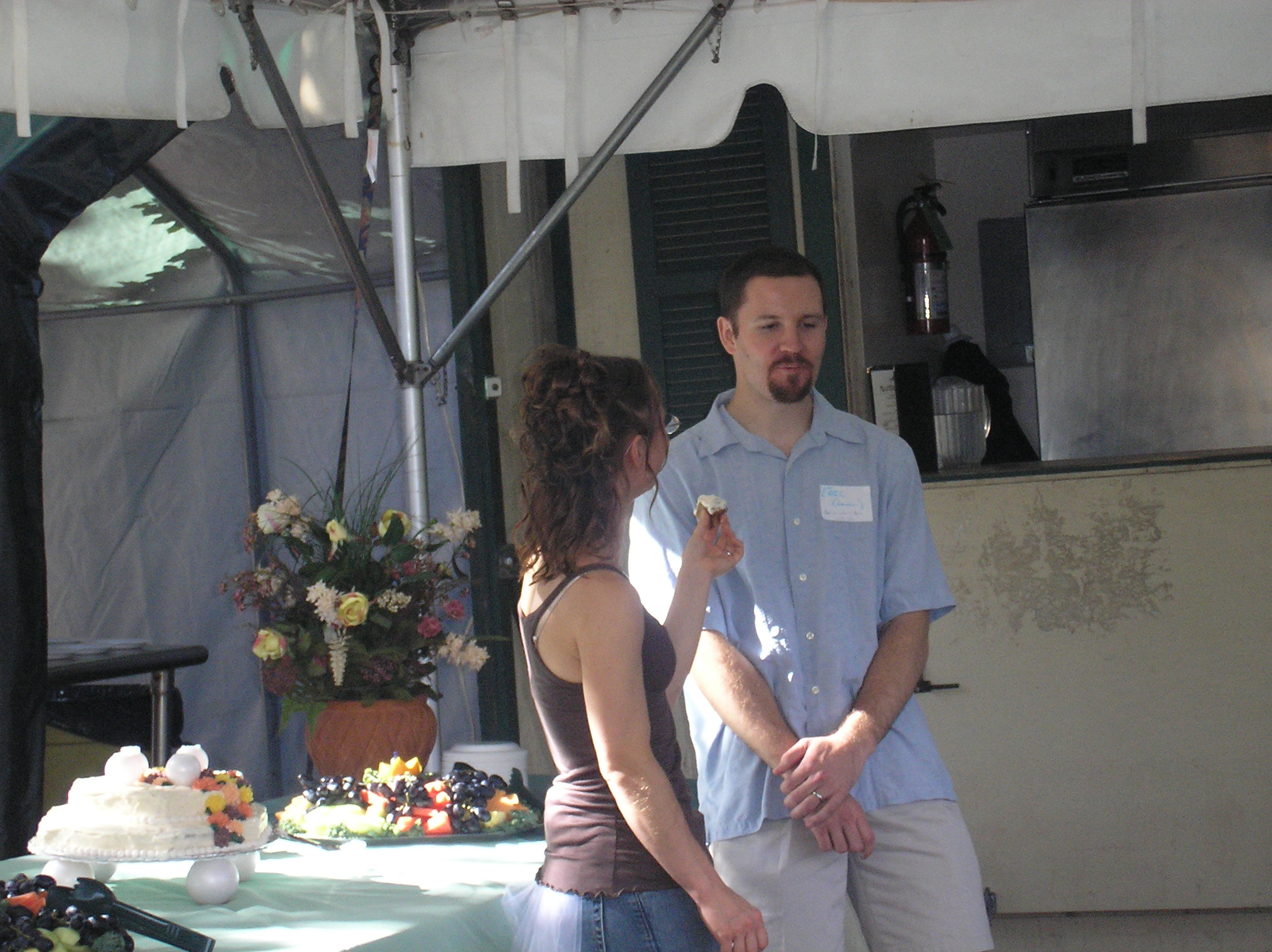 Eric waits to wear the cake