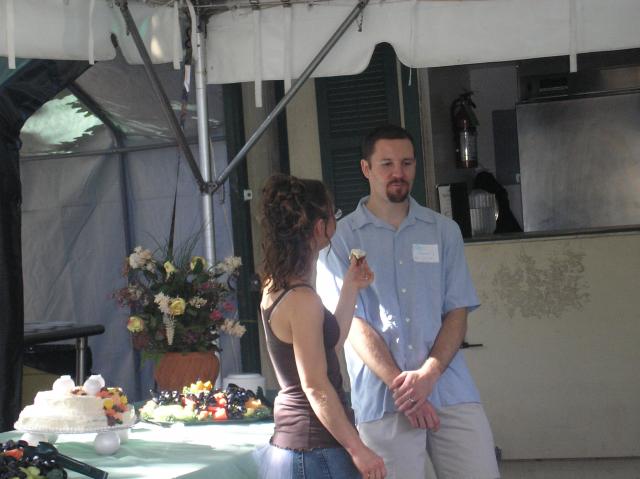 Eric waits to wear the cake