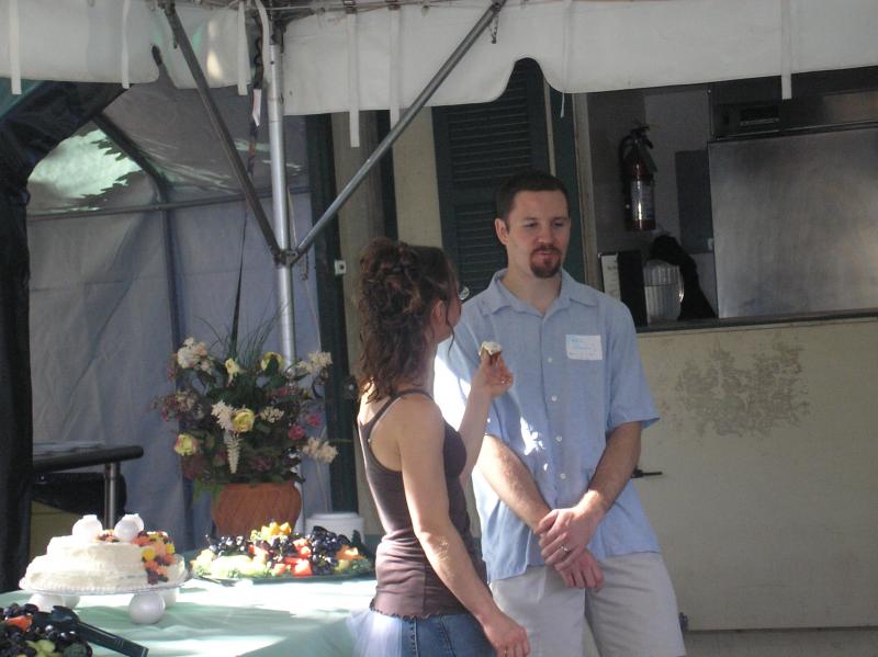 Eric waits to wear the cake